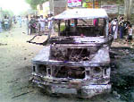 The charred police vehicle in Bathinda