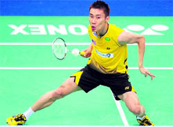 Lee Chong Wei of Malaysia in action during the Yonex-Sunrise India Open Superseries at the Siri Fort Sports Complex in New Delhi on Sunday. Lee won 21-12, 12-21, 21-15 to lift the title