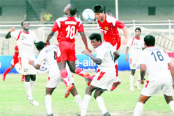 JCT and Pune FC players in action in Ludhiana on Sunday