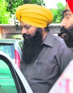 Mahilpur MLA and CPS (Agriculture) Sohan Singh Thandal coming out of the Mohali Court on Monday