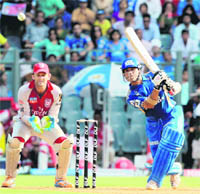 Mumbai Indians� Sachin Tendulkar plays a shot against Kings XI Punjab during their match at the Wankhede Stadium in Mumbai on Monday. Mumbai Indians won the match by 23 runs.