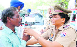 Traffic police personnel during a drive against drunken driving in Patiala. 