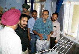 District Magistrate Balwinder Singh conducting an inquiry about the incident in connection with the escape of 13 youth from the  GGS Medical College and Hospital, Faridkot on Friday. 