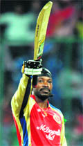 Royal Challengers� Chris Gayle celebrates his century against Kings XI Punjab in Bangalore on Friday