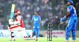 Dinesh Karthik plays a shot against Mumbai Indians in Mohali
