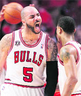 Chicago Bulls' Carlos Boozer (5) celebrates victory over Atlanta Hawks in their NBA playoffs in Chicago on Tuesday. Bulls lead 3-2.