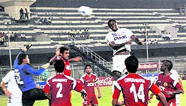 JCT and Chirag United players in action in Ludhiana on Sunday.