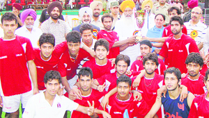 The victorious Delhi team pose with their trophy in Jalandhar