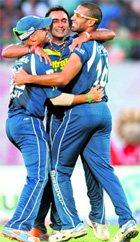 Deccan Chargers players led by Amit Mishra (C) celebrate their victory over Kings XI Punjab at The Himachal Pradesh Cricket Association Stadium in Dharamsala on Saturday. 