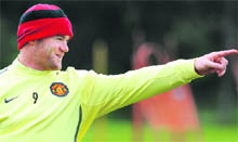 Wayne Rooney takes part in a training session in Manchester on Friday. United will take on Barcelona in the UEFA Champions League final at Wembley on Saturday