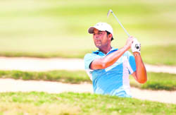 Arjun Atwal hits a bunker shot during the third round of the HP Byron Nelson Championship in Texas on Saturday.