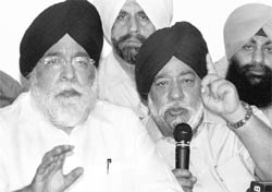 PS Sarna, DSGMC president (right) and HS Sarna, general secretary, SAD, Delhi, at a press conference in New Delhi on Tuesday