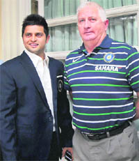 Captain Suresh Raina and coach Duncan Fletcher prior to leaving for the West Indies in Mumbai