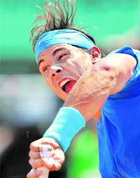 Rafael Nadal serves during his  match against Andy Murray in Paris on Friday. Nadal won 6-4, 7-5, 6-4. 