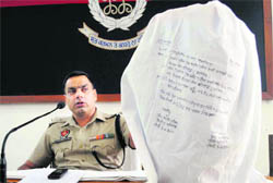 SP Satvir Singh Attwal shows the recovered contraband to mediapersons in Patiala on Saturday. 