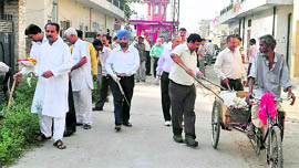 Nangal residents and volunteers of an NGO clean the streets on the World Environment Day on Sunday.