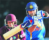 Virat Kohli plays a shot during the second ODI between West Indies and India at the Queen's Park Oval on Wednesday.