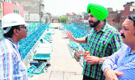 MP Navjot Singh Sidhu inspects the under-construction elevated road in Amritsar on Sunday. 