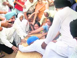 The body of Harjit Singh (22), who was killed in a racial attack in England on May 14, reached his native village Kallha, 14 km from Tarn Taran, on Thursday. 