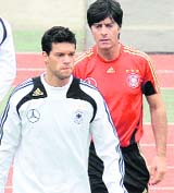 Michael Ballack (L) with German coach Joachim Loew .
