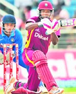 Darren Bravo sweeps Amit Mishra as wicketkeeper Parthiv Patel looks on in the fifth ODI at Sabina Park Stadium in Kingston