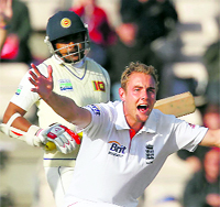 Stuart Broad (L) appeals unsuccessfully for the wicket of Rangana Herath in Southampton, on Monday