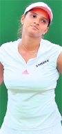 Sania Mirza reacts after losing against Virginie Razzano