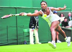 Serena Williams hits a return against Aravane Rezai. Serena won 6-3, 3-6, 6-1