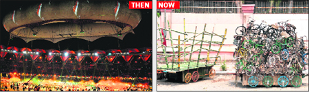 The closing ceremony of the XIX Commonwealth Games in progress and (right) items used in the opening ceremony still lie unattended outside the stadium