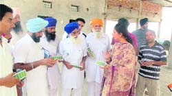 Officials from the Krishi Vigyan Kendra imparting training to farmers