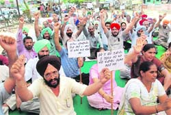 Members of the Punjab Draughtsmen Association during a protest in Bathinda