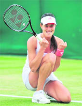 Ana Ivanovic reacts after beating Eleni Daniilidou in London on Thursday. 