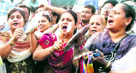 Activists of the BJP women�s wing protest against fuel price hike in Amritsar on Saturday.