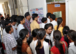 Participants waiting for their turn at the job fair organised by the Baba Farid Group of Institutes in Bathinda on Sunday