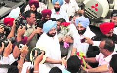 Congress workers welcome Capt Amarinder Singh at a meeting in Jalandhar