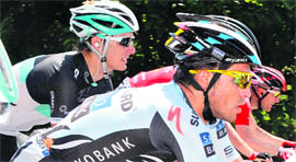 Luxembourg's Andy Schleck (L) rides with Spain's Alberto Contador during the third stage of the Tour de France on Monday. 