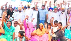 Voicing their concern: Former MLA Jagbir Singh Brar along with representatives from various villages during a protest against the waste treatment plant, in Jalandhar 