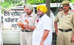 Baljit Singh, a conductor with the Punjab Roadways, at the Shambhu barrier in Patiala.