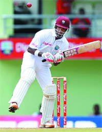 West Indies cricketer Darren Bravo avoids a bouncer from Ishant Sharma during the second day of third Test at the Windsor Park Stadium in Dominica on Thursday. 