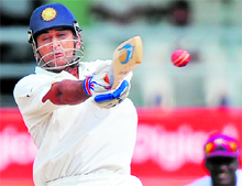 Mahendra Singh Dhoni pulls Fidel Edwards during the fourth day of third and final Test match between India and West Indies at Windsor Park Stadium in Roseau, Dominica on Saturday