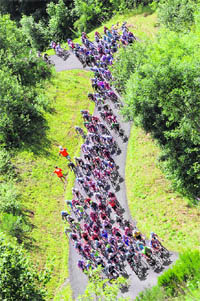 The pack rides during the 208 km ninth stage of the Tour de France on Sunday. � AFP