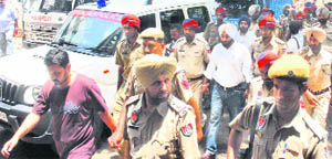 The accused being produced in the court in Jalandhar 
