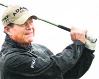 Tom Watson tees off during the British Open in Sandwich 