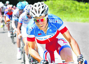 France's Sylvain Chavanel starts to breakaway in the 168.5 km fourteenth stage of Tour de France 