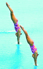 Ukraine's Anna Pysmenska and Olena Fedorova compete in the women's 3m synchronised springboard diving final in Shanghai  
