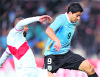 Uruguayan forward Luis Suarez (R) during Copa America semi-final in La Plata on Tuesday