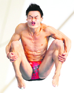 China's Qin Kai competes in the men's 3m springboard final at the 14th FINA World Championships in Shanghai on Friday.