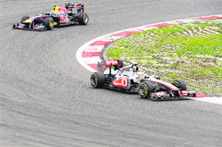 McLaren Mercedes' Lewis Hamilton drives at the Nurburgring racetrack in Nurburg on Sunday