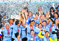 Uruguay players and officials celebrate winning the Copa America final against Paraguay in Buenos Aires on Sunday. Uruguay won 3-0.