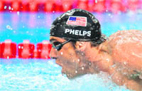 Michael Phelps competes in the final of the 200-metre butterfly in the FINA World Championships at the indoor stadium of the Oriental Sports Center in Shanghai 